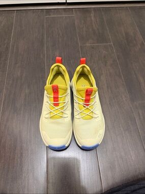 On Running Kids Sneakers in Yellow with Red and Blue Accents